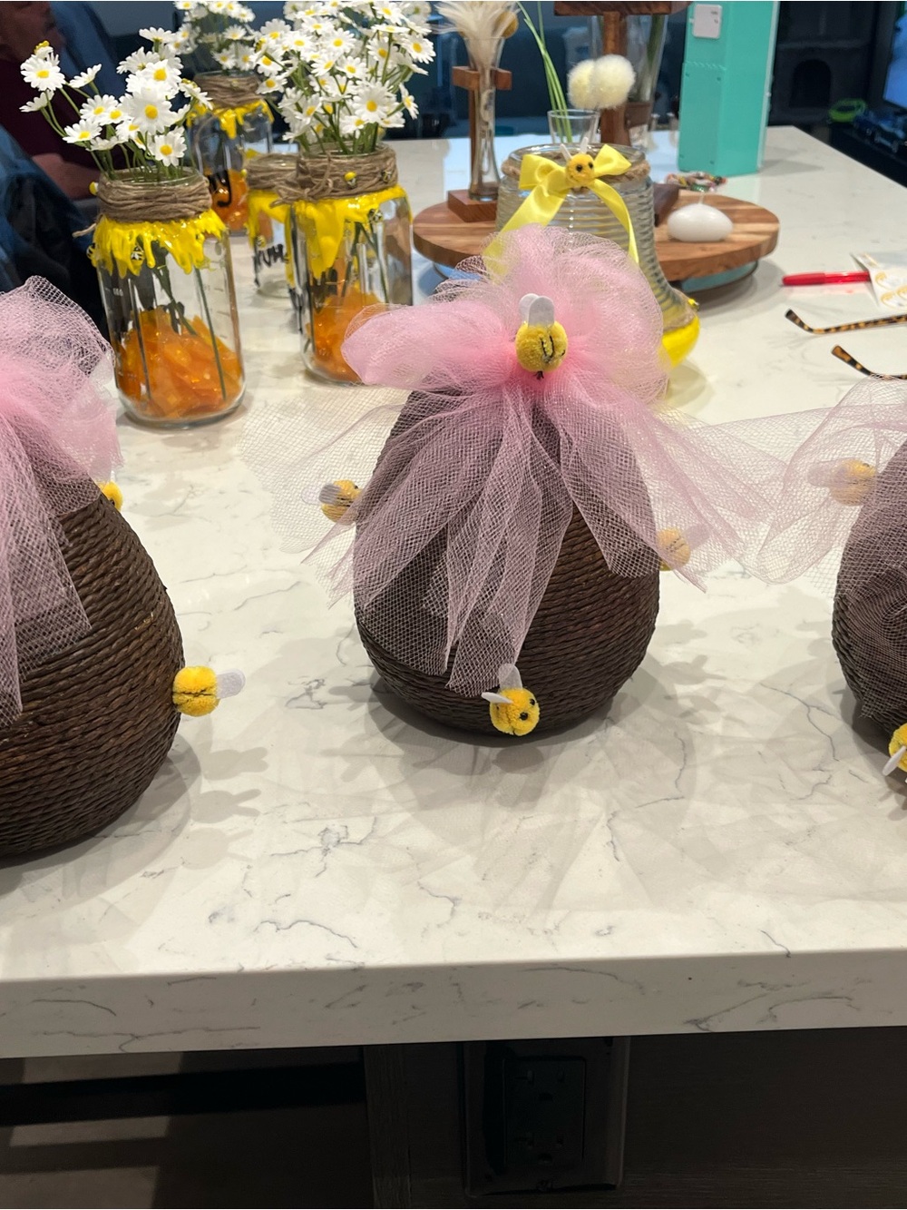 Handcrafted Brown Rope bee hive shaped with Pink Tulle and Yellow Bee Accents